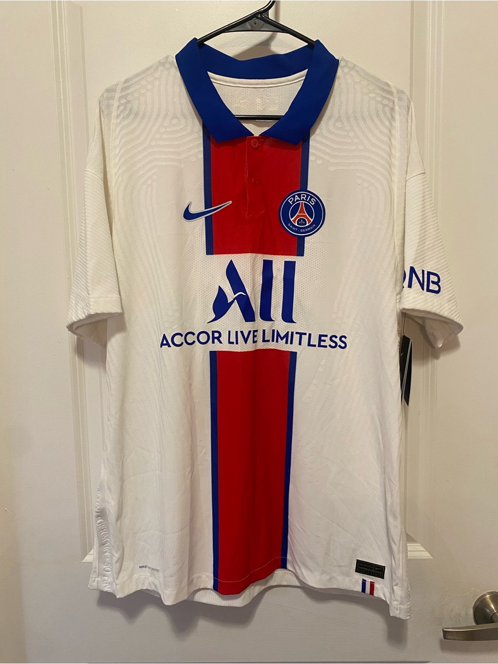 Nike White Paris Saint Germain Jersey with Red & Blue Stripe